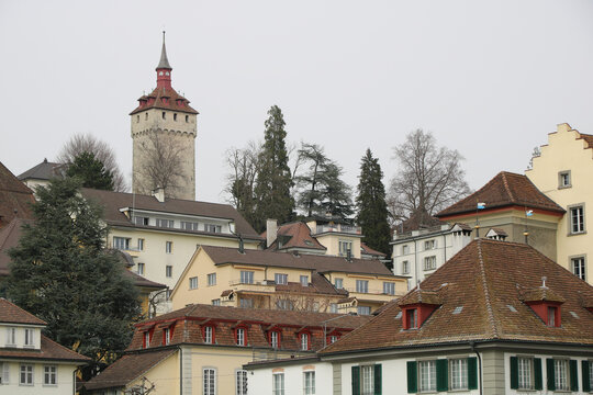Roofs of houses in Lucerne and Wachtturm, historic tower.