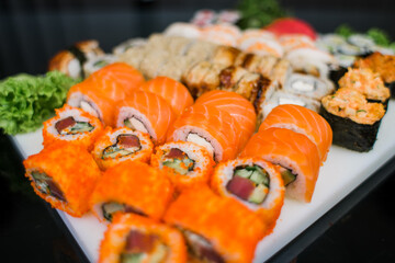 set of rolls set sushi with avocado shrimp salmon and eel