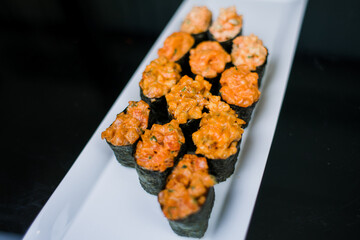 sushi rolls on a plate japanese cuisine delivery