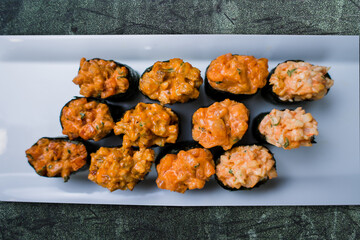 sushi rolls on a plate japanese cuisine delivery
