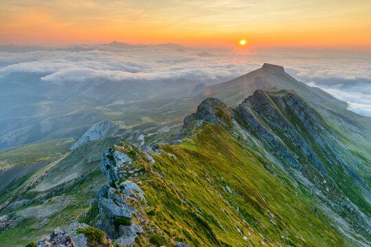 Mountain ridge and clouds in morning