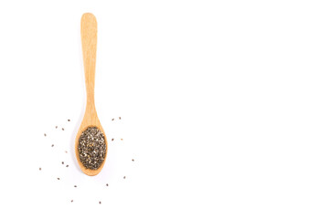 Wooden spoon and wooden fork with seeds isolated on white background.