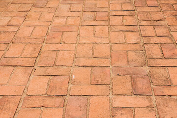 Old red brown brick floor pattern texture.
