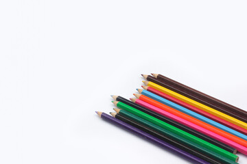 Colored pencils background. Color pencils on white background.