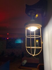 Glowing wireframe lantern in the night