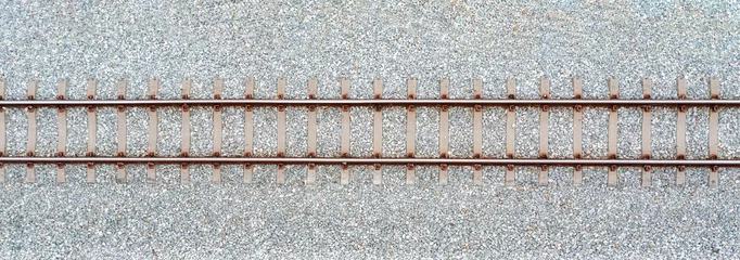 Deurstickers Bovenaanzicht van spoorrails. Banner panorama achtergrond © Sunday Stock
