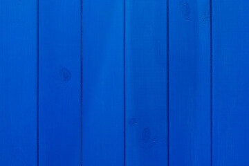 Fototapeta premium Texture of blue wooden surface fence vertical lines board abstract plank background