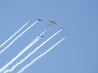 World War II aircraft performing at an airshow in the skies of southern California.