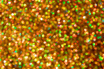 Cute abstract multicolor pastel multicolored sequins sparkle confetti background for invitation, festive blurred background.