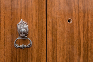 Fototapeta premium Repair and reconstruction, restoration of the iron antique door retro vintage style old handle, close-up