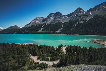 Fototapeta na wymiar blue lake in the mountains in summer