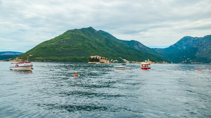 perast island in montenegro view from the sea cloudy day