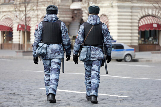 Russian military forces of National Guard in bulletproof vests patrol the Red square in Moscow