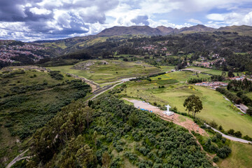 Fototapeta premium Aerial view of Cristo Blanco and Sacsayhuaman ruins in Cusco, Peru