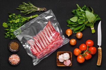 Vacuum sealed rack of lamb with ingredients