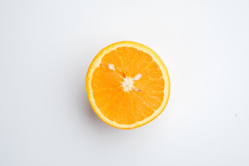 Half of an orange on a white background.