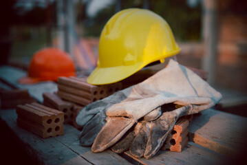 Safety helmet (hard hat) and Dirty Protective Glove for engineer, safety officer, or architect,...