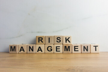 Words risk management from wooden blocks. Business strategy, analysis concepts