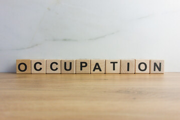 Word occupation from wooden blocks. Job, profession, occupancy concepts