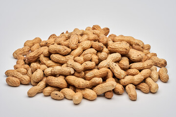 Dried peanuts on white background