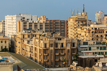ALEXANDRIA, EGYPT - January 2022: Old Egyptian city rooftops and sea view with historical buildings