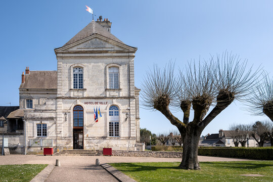 City hall in Beaulieu les Loches on a winter sunny afternoon, Loire Valley, France. The Ukrainian flag is visible