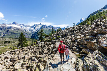 Amazing view of touristic trail near the Matterhorn in the Swiss Alps.