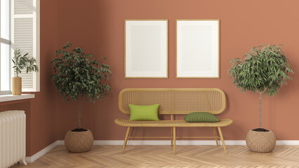 Frame mockup, modern wooden living room in orange tones, lounge, waiting room with rattan sofa, potted plants. Herringbone parquet, window with shutters. Scandinavian interior design