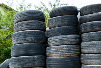 Fototapeta na wymiar A pile of old car tires