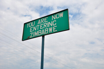 You are now entering Zimbabwe Sign on the border to Zambia