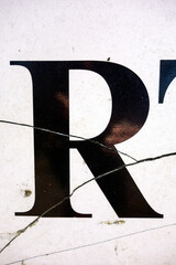 Written Wording in Distressed Typography Found Letter R