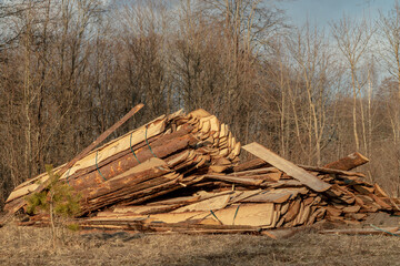 wooden boards piled on a stacks. Side boards of timber logs	