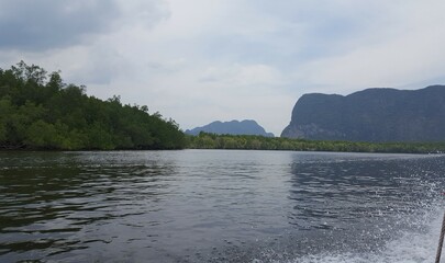 Beautiful sea surrounded by lush green islands near Phi Phi islands of Krabi, Thailand