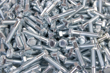 metal bolts on a white background. engineering fasteners