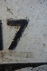Written Wording in Distressed Typography Found Number 7 Seven