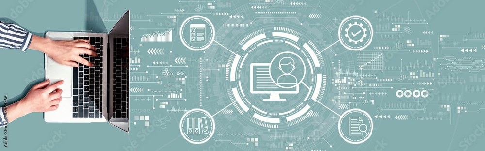 Poster document management system concept with person using a laptop computer