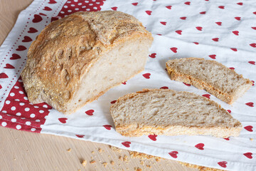 Sliced bread on a table with a cloth - 495965545