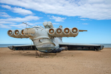 Fototapeta na wymiar Abandoned rocket ship-ekranoplan Lun. Surroundings of Derbent, Republic of Dagestan