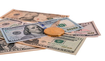 Dollar banknotes and gold coins isolated on white background.