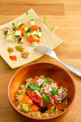 couscous with tuna, peppers, aubergine and courgettes, traditional dish of Moroccan cuisine