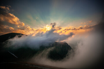 Fototapeta premium sunset over the mountains