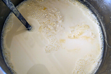 Fat milk cream on cooked milk, which is formed on natural cow's milk,