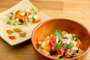 couscous with tuna, peppers, aubergine and courgettes, traditional dish of Moroccan cuisine