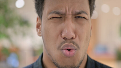Fototapeta premium Close up of Shocked Young Businessman