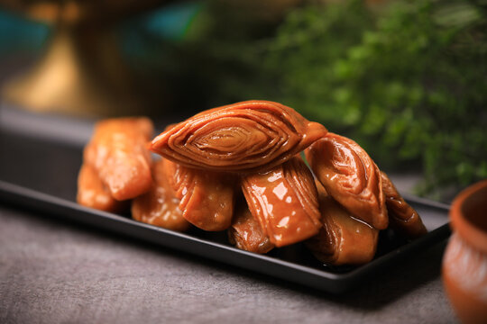 khaja south indian famous sweet closeup with selective focus and blur