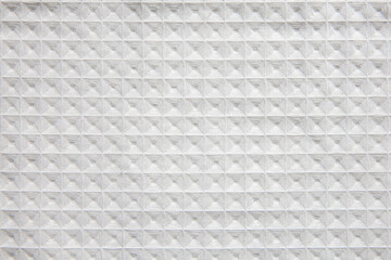 White cotton waffle towel with square fabric texture. Abstract background