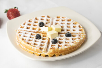 Waffle with butter and blueberry