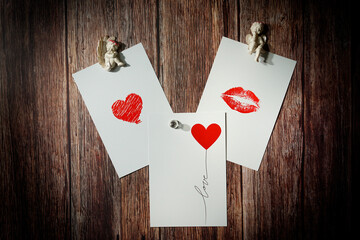 Red hearts on old wood background.Happy valentine's day card.Place for text.	
