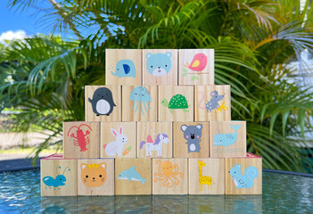 wooden game cubes for kids palm tree in the background