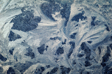 Naklejka premium Ice frost patterns on winter glass